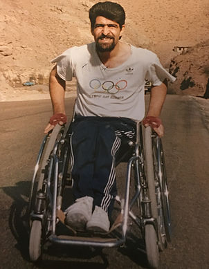 Hossein Nik Nikzaban wheeling through the desert during his world tour